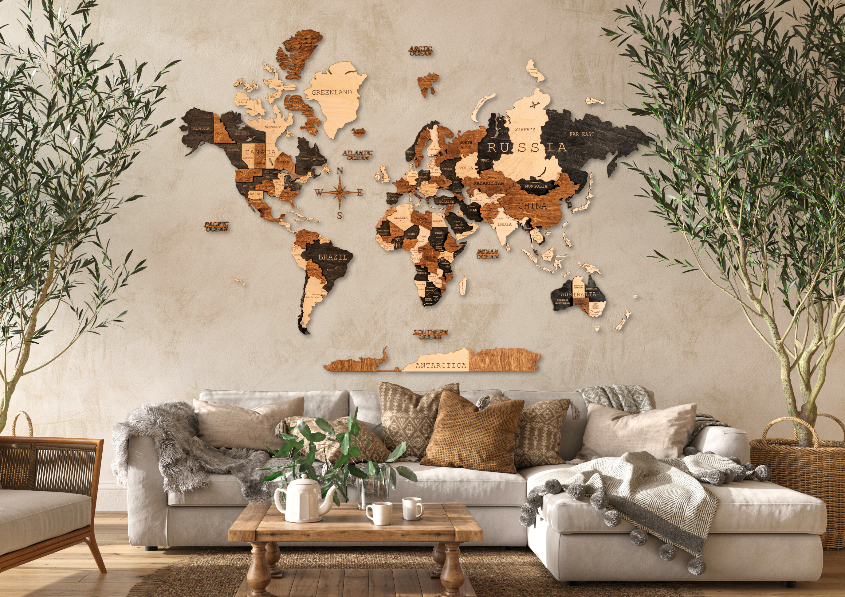 World map wall decoration in a living room setting with a sofa and plants.