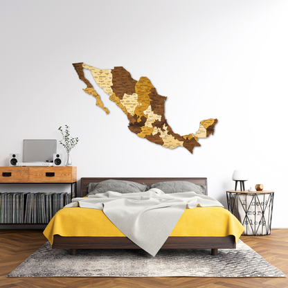 Bedroom with a wooden wall decoration shaped like Mexico, yellow bedding, and a wooden desk.