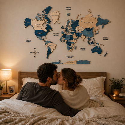 Couple in bed with a world map on the wall