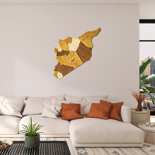 Decorative 3D Wooden map of Syria in a living room setting with a sofa and plants.