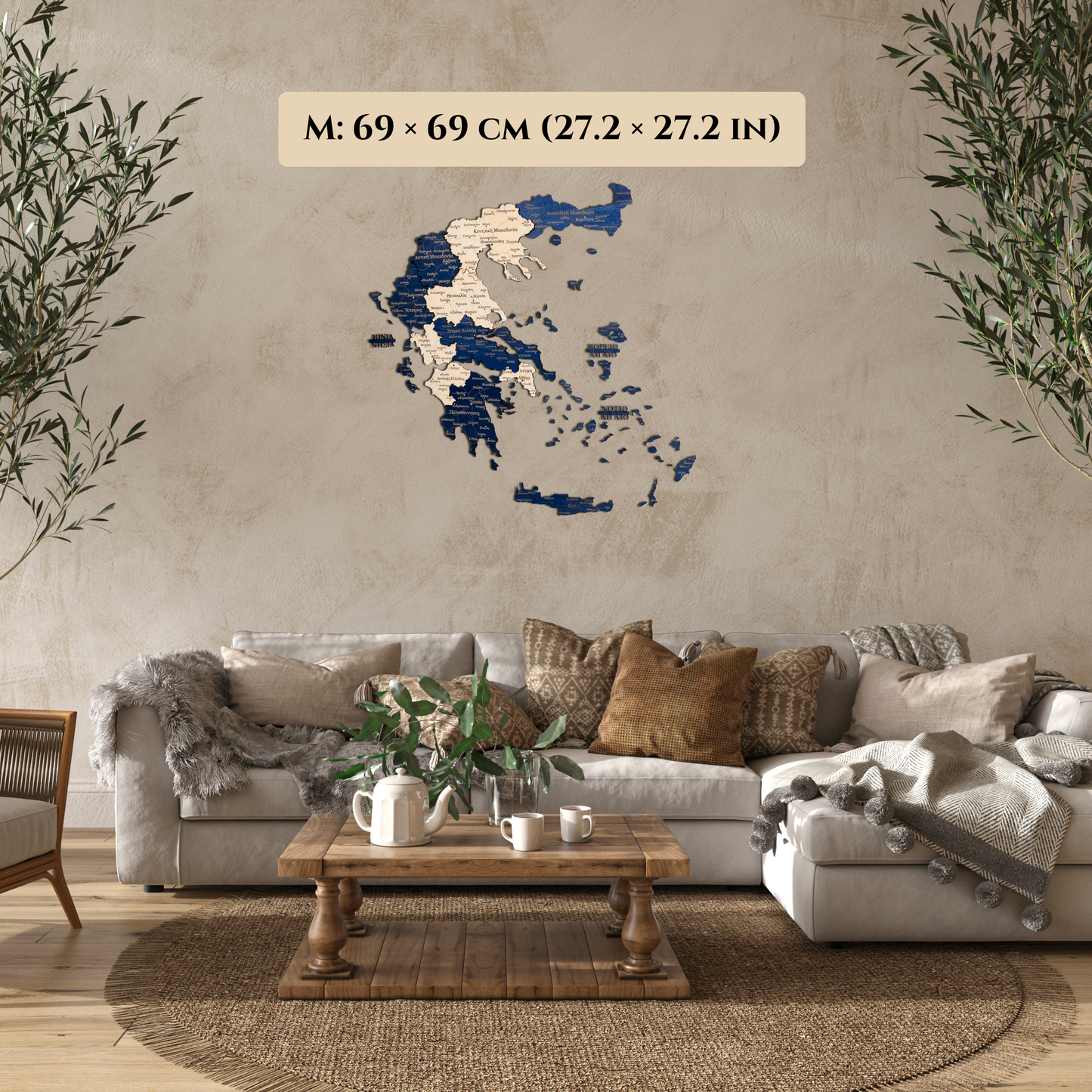 Living room with a 3D Wooden map of Greece, sofa, coffee table, and decorative items.