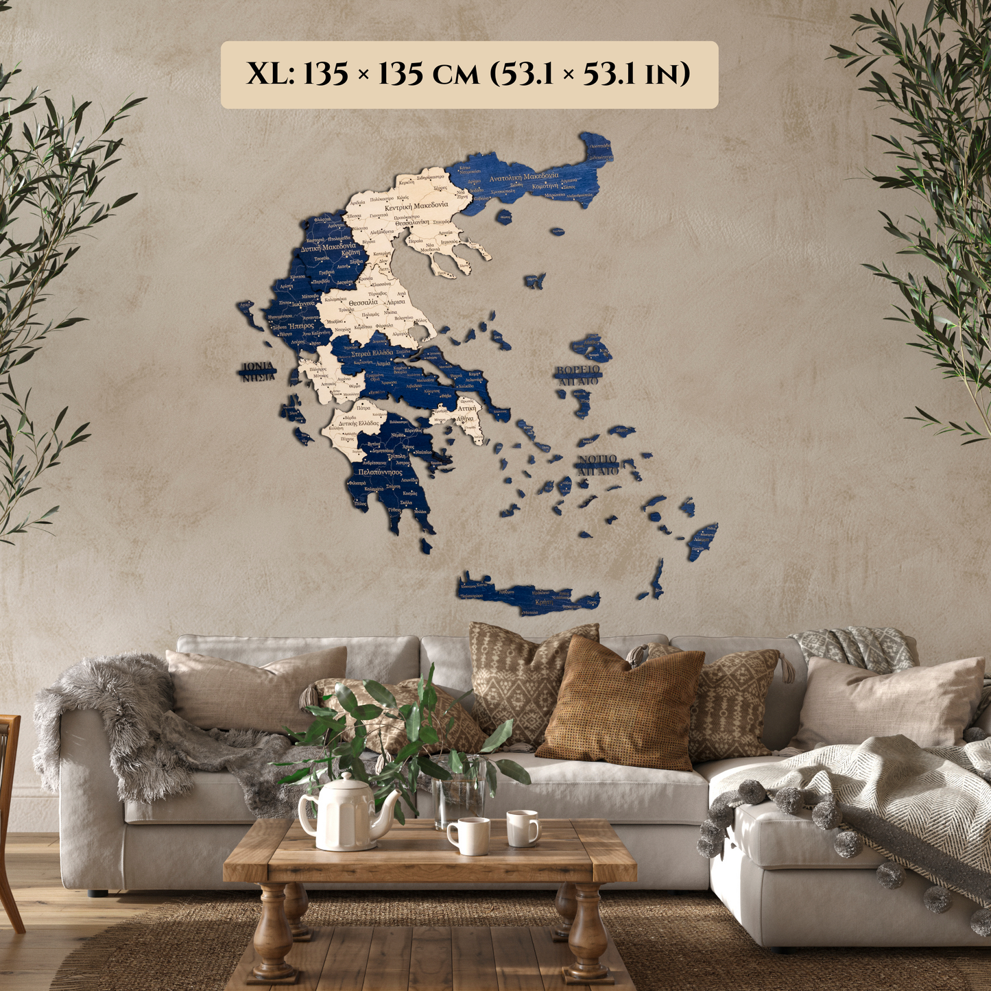 Wall art of a blue Greece wooden map on a wall above a sofa in a living room.