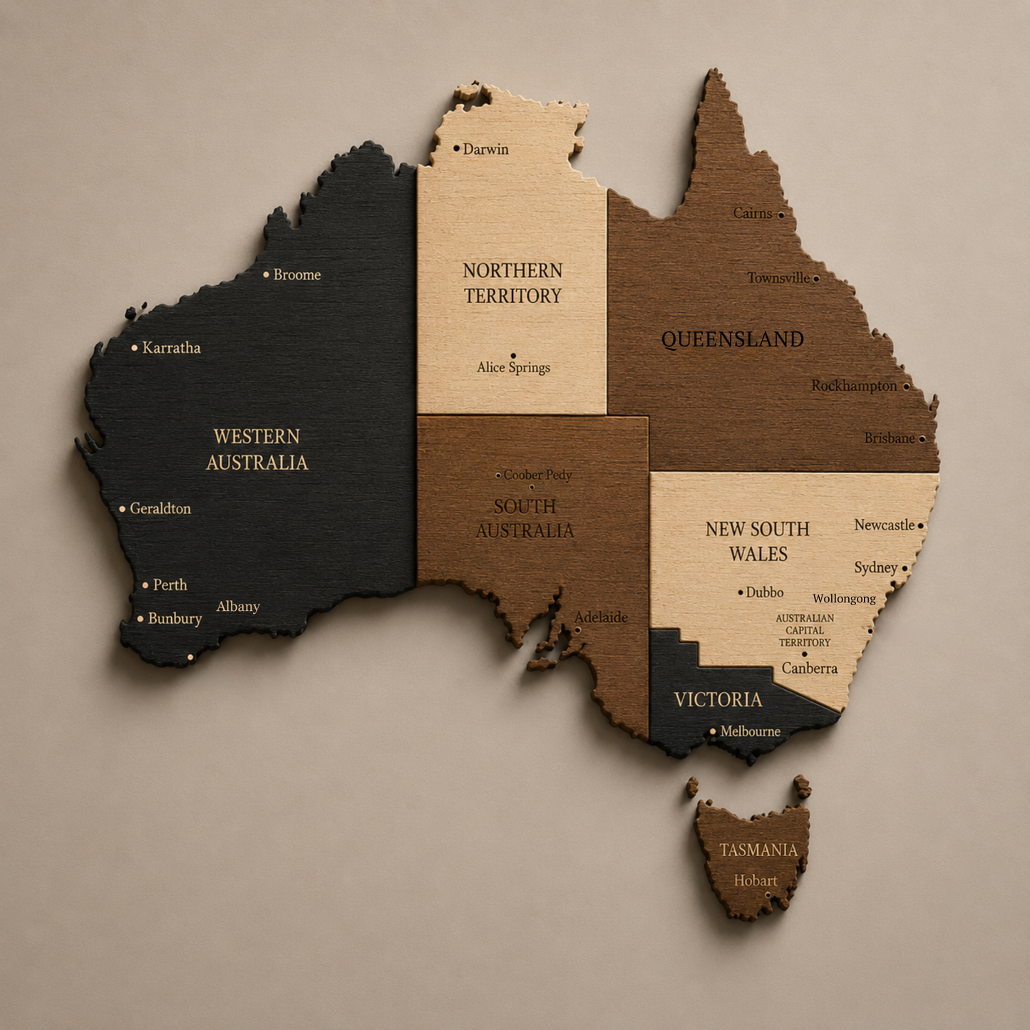 Wooden map of Australia with labeled states on a beige background