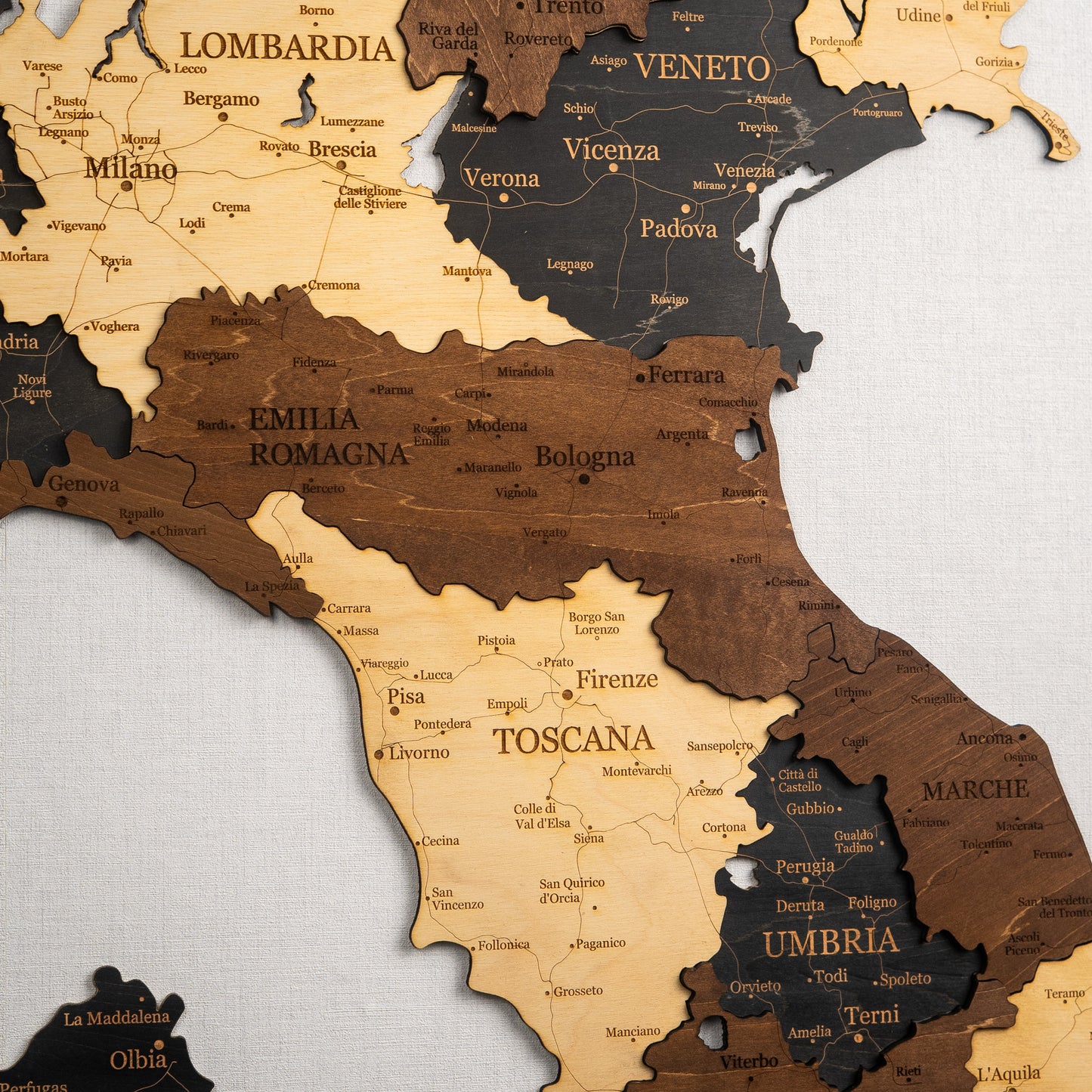 Wooden map of Italy with regions highlighted