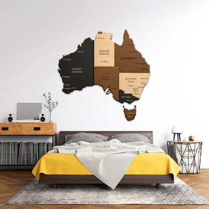 Wooden wall art of Australia's map in a bedroom setting