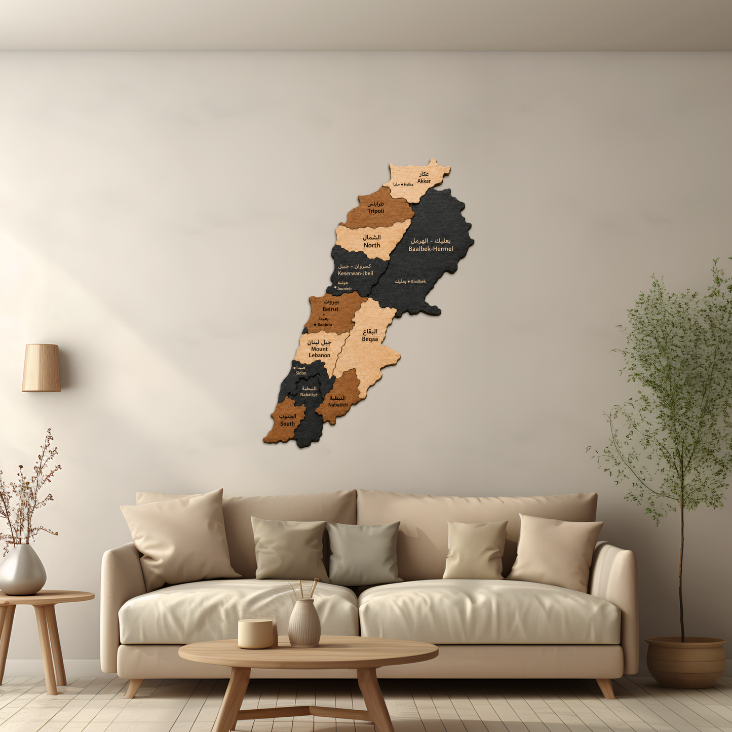 Wooden wall decoration shaped like a map of lebanon on a beige wall above a beige sofa.